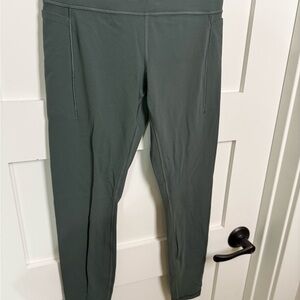Athleta Transcend Stash Tight in Olive